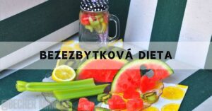a vibrant display of fresh fruits and vegetables including watermelon, kiwi, celery, lemon, and strawberries, arranged for a protein-free, plant-based diet setup with an infused water jar in the background.