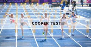 a group of female athletes mid-stride during a 100-meter hurdles race at a track championships, showcasing dynamic running form.