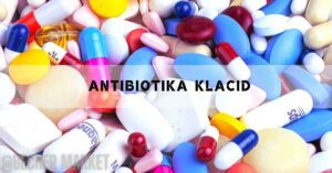 a colorful assortment of various pill shapes and colors representing antibiotics, including Klacid tablets.