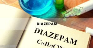 a close-up of a box labeled "diazepam" with chemical formula C16H13ClN2, alongside test tubes containing blue liquid and greenish crystalline substance.