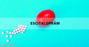 pink escitalopram tablets with a red brain illustration representing its use as an SSRI antidepressant