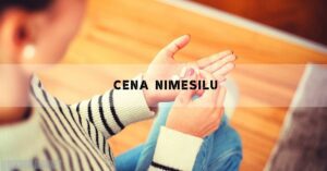 two people holding hands in a supportive gesture, blurred background with warm lighting
