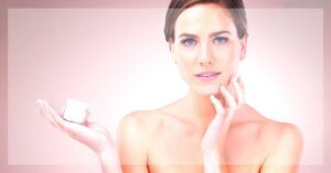a person applying skincare product near the face, highlighting smooth skin care routine for clear complexion