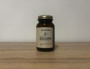 a dark brown glass jar of NEURINU Super BACOPA dietary supplement with 50 capsules, labeled for natural cognitive support.