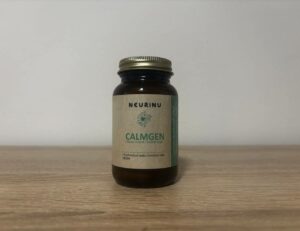a dark bottle of NEURINU Calmgen dietary supplement, labeled for stress and mental relaxation support, with 50 capsules net weight.